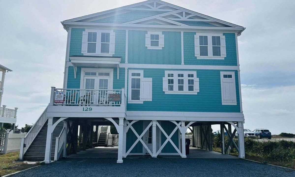 Holden Beach House | 1 Fine Day, a 4BR oceanfront retreat in Holden Beach, sleeps 10 with stunning views.