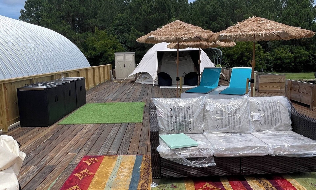 Merritt RV Rental | Air conditioned Glamping Tent overlooking a beautiful orchard