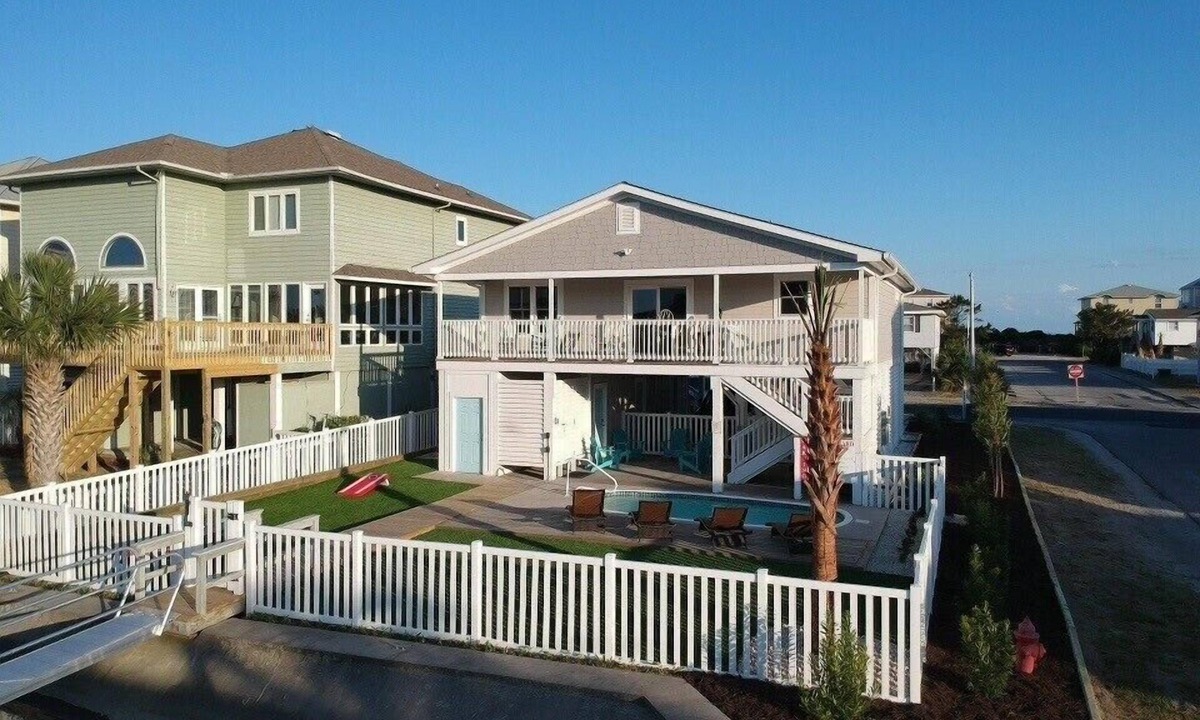 Ocean Isle Beach House | Canal/w dock, pool, ocean view, 1 block from beach & EV charger