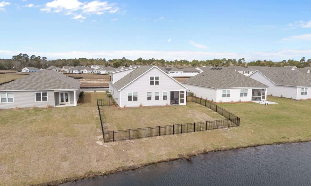 Supply House | Coastal Family Getaway Near Holden Beach with water views, covered patio & games