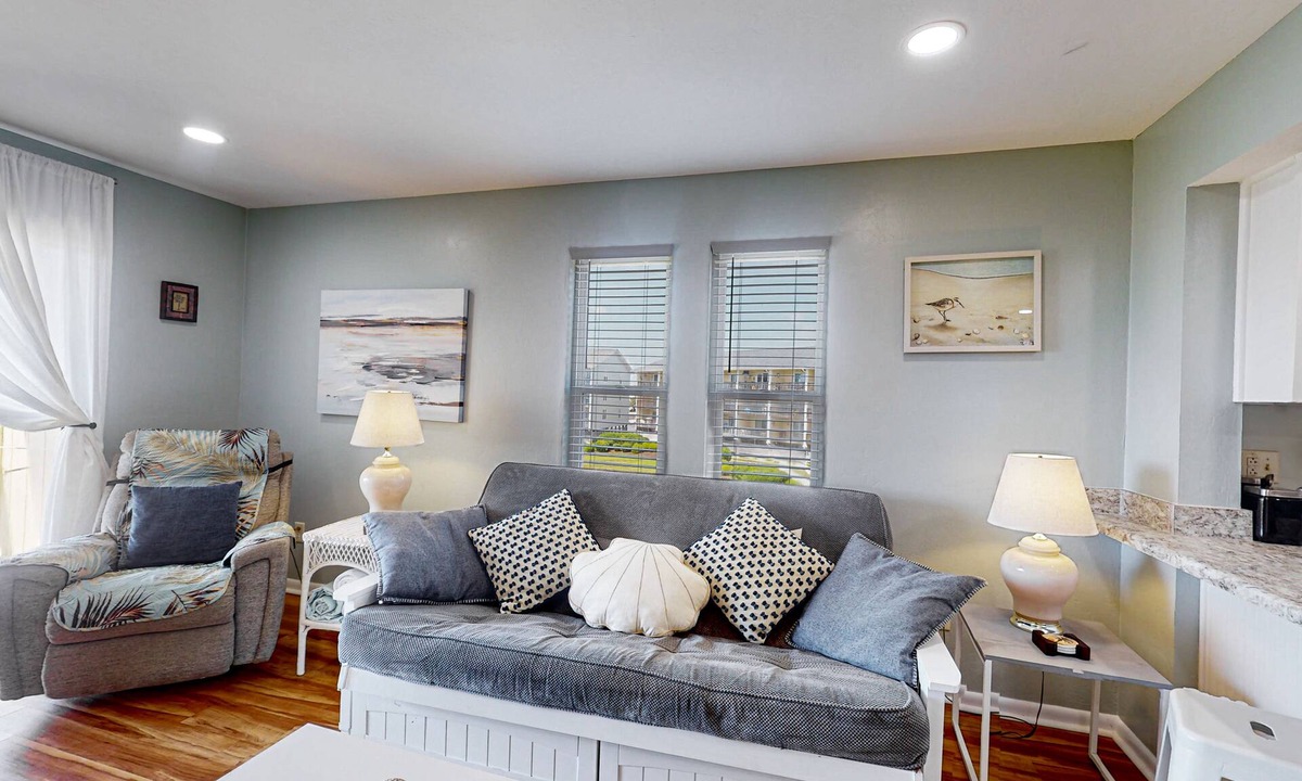 Surf City Condo | Dreamy beach condo with pool, easy beach access & furnished balcony with views