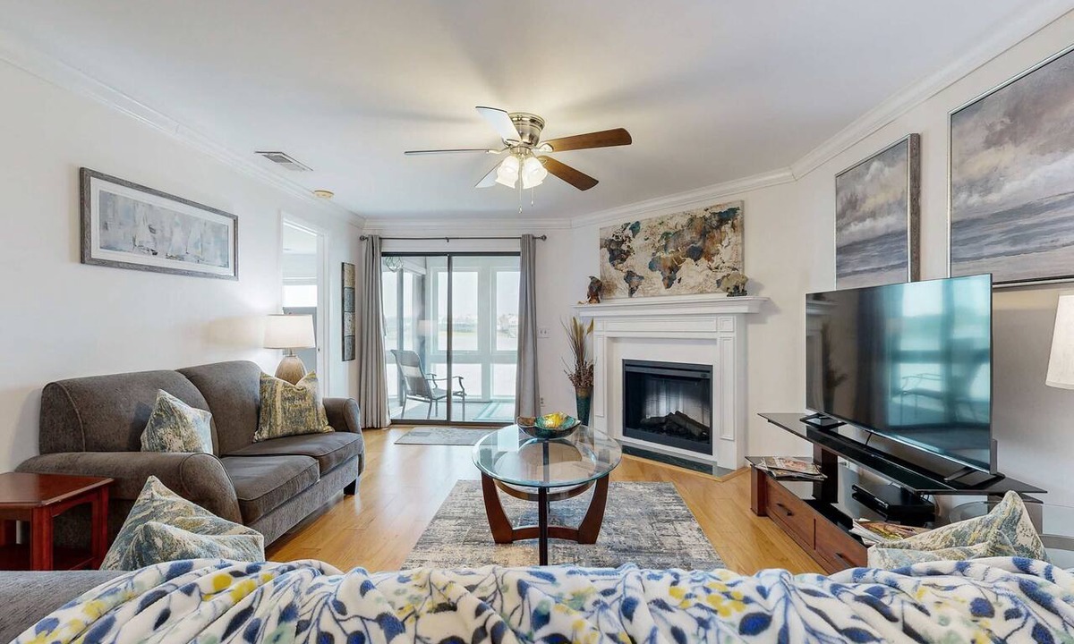 Folly Beach Condo | Elegant riverfront condo with access to private W/D, central AC, and pool access