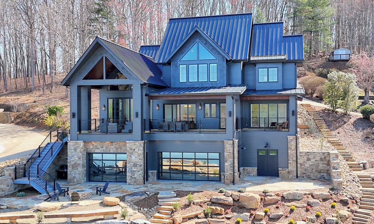 Elf House | Endless Sunsets By Chatuge Home Concierge private boat dock with covered boat slip and sun deck, bar, fire pit, pool table, kayaks