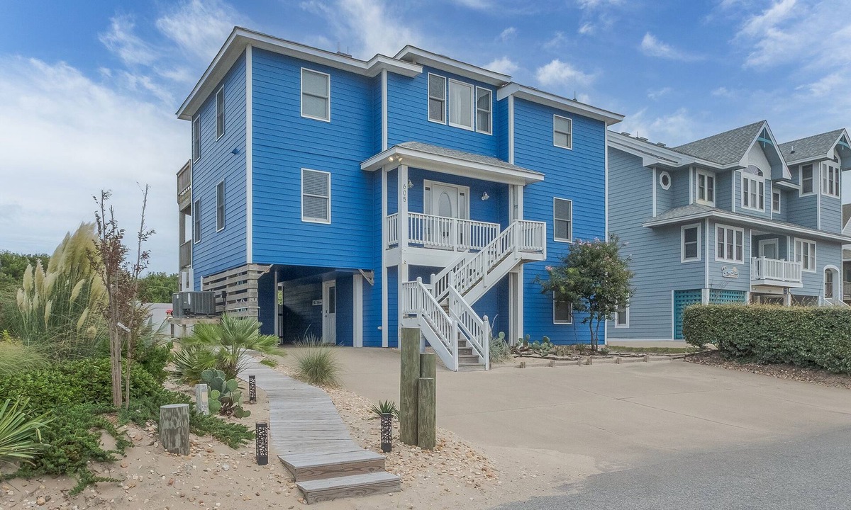 Ocean Sands House | Experience luxury at 1861 - Into the Mystic, a spacious 6-bedroom oceanfront home in Corolla, NC.
