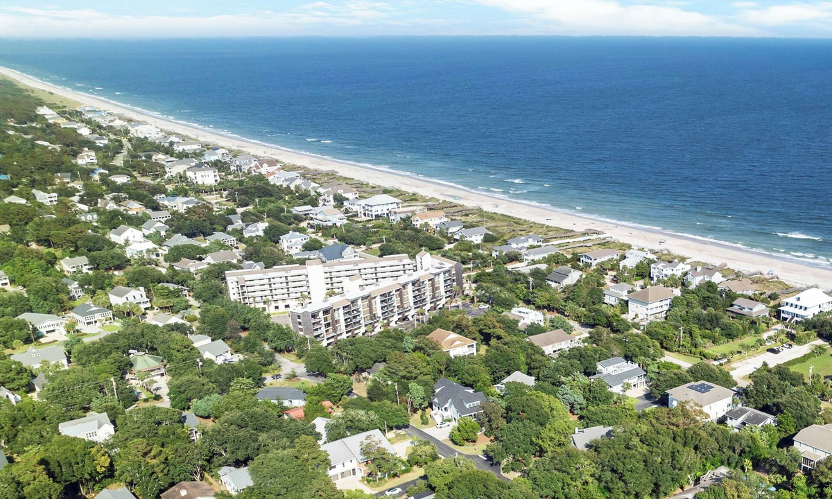 North Litchfield Beach Condo | Fourth Floor Condo across from Beach Access, Balcony, Pool, Grill Area, Elevator