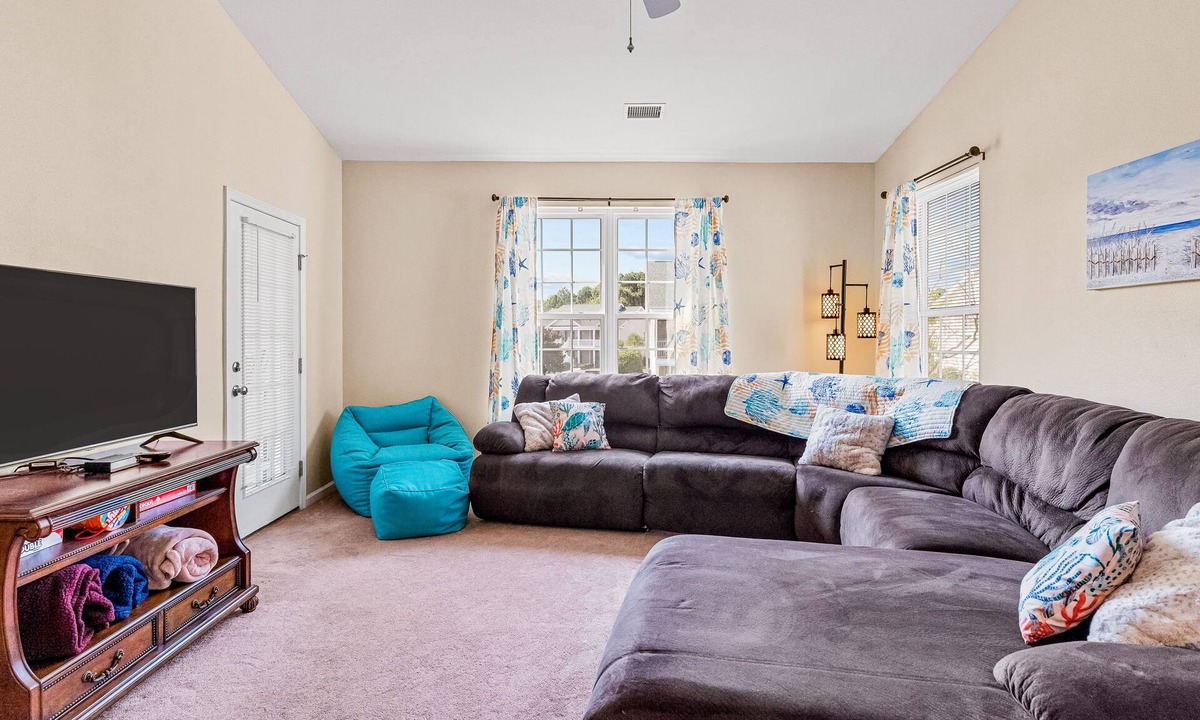 Sunset Beach Condo | Lovely condo with water view, balcony, full kitchen & W/D - dog-friendly