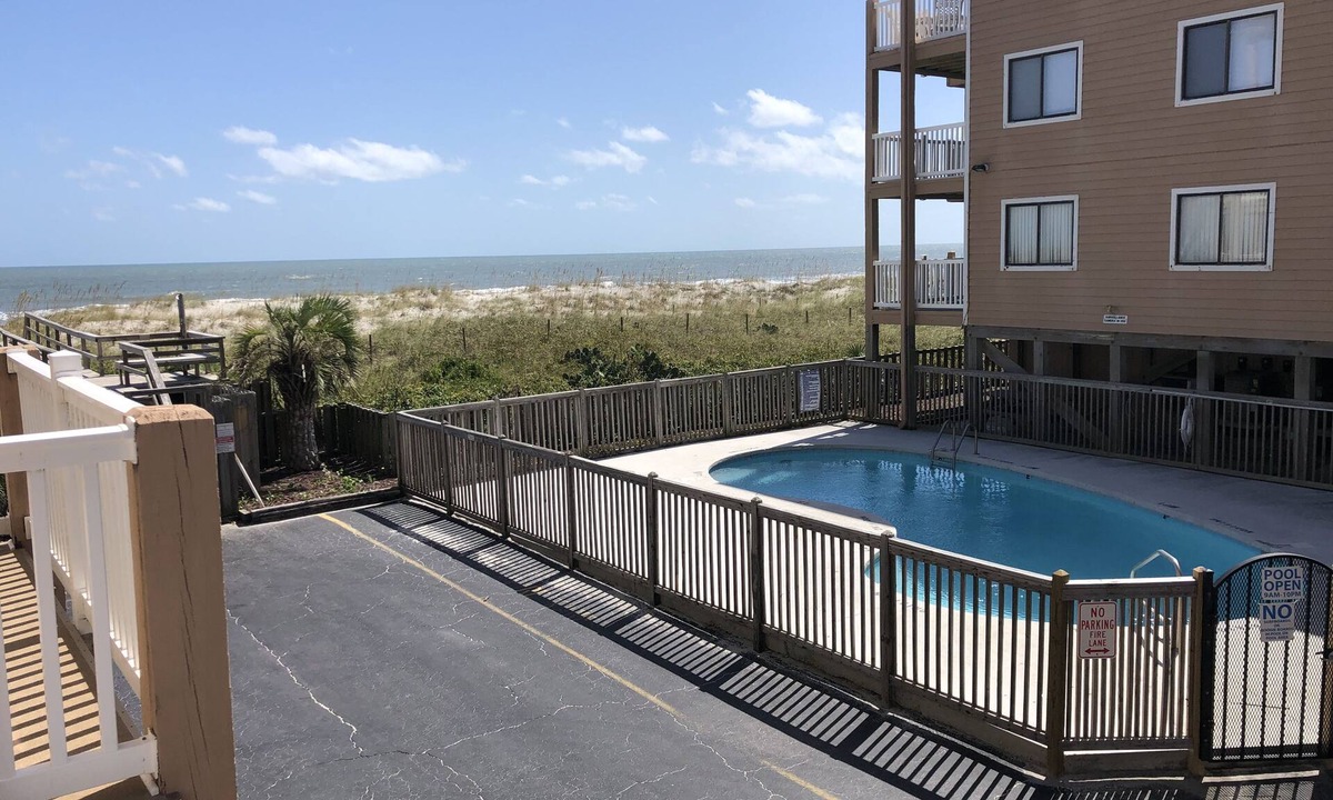 Wilmington Beach Condo | Memories start where the sand ends & the ocean begins! Ocean views, Pool & WIFI