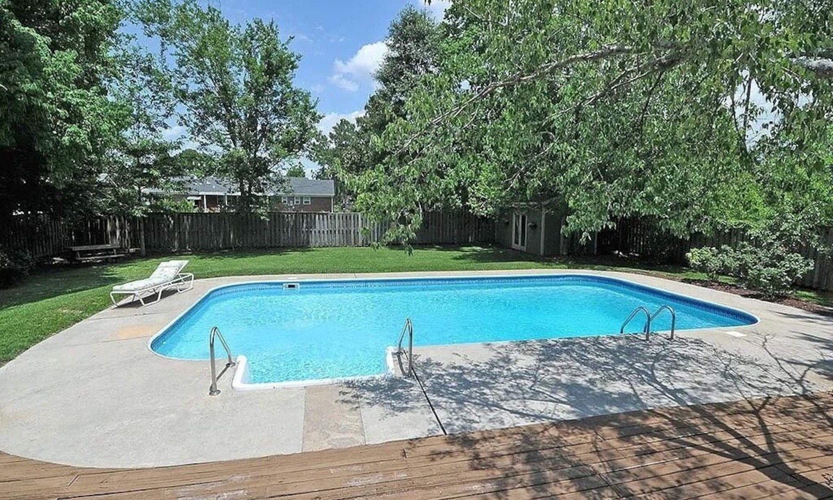 Wilmington House | Oasis in the middle of town for large groups with pool and 2 Master bedrooms.