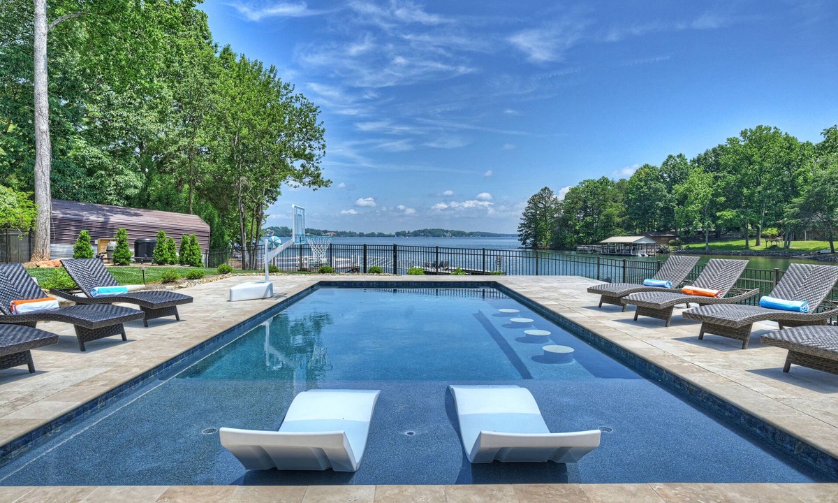 Denver House | Private Dock, Boat Ramp, Saltwater Pool & Waterfront Firepit | Bright Water Cove
