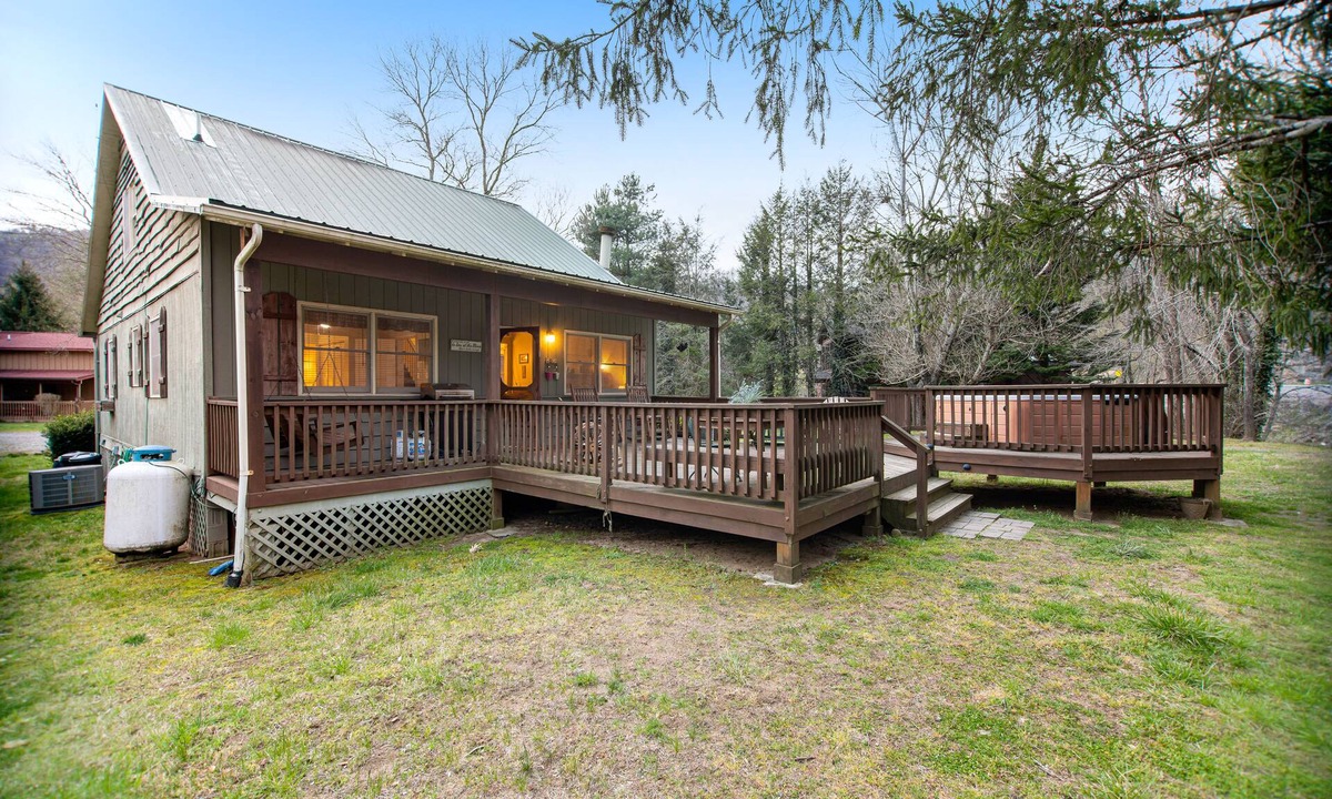 Cullowhee Cottage | Quiet dog-friendly riverfront house with large back deck, hot tub, fireplace