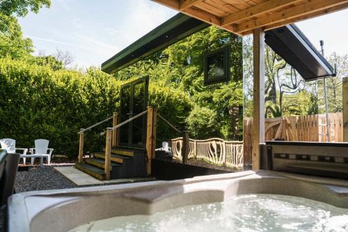 Carlisle House | Reflections, Netherby, a micro cabin with hot tub in a rural setting