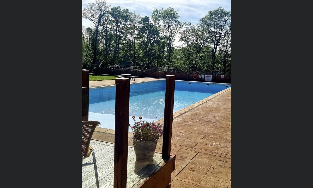 Bont Newydd Cabin | Riverside Cabin with Large Decking Area set in 120 acre Country Park, Snowdonia