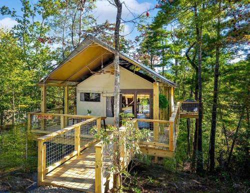 Zirconia House | Secluded Glamping Tree Tent with Outdoor Soaking Tub & Private Pizza Oven Near Waterfalls, Zirconia, NC
