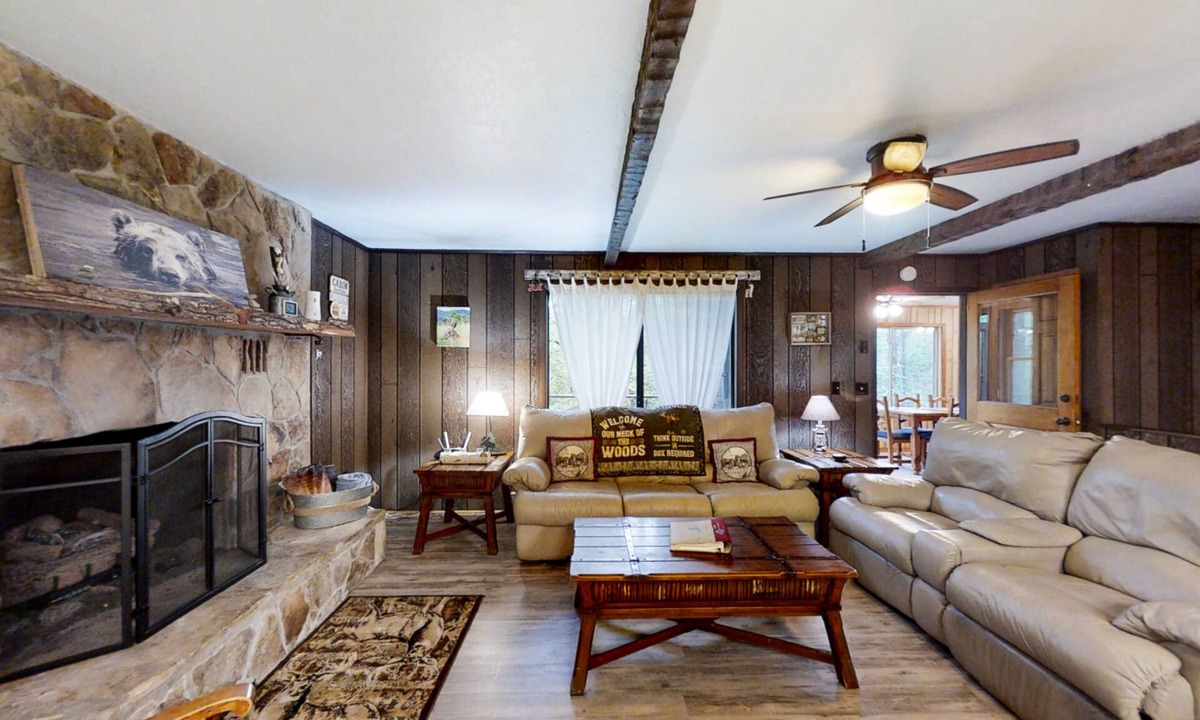 Murphy House | Secluded home with deck, firepit, sunroom, gas fireplace, & W/D