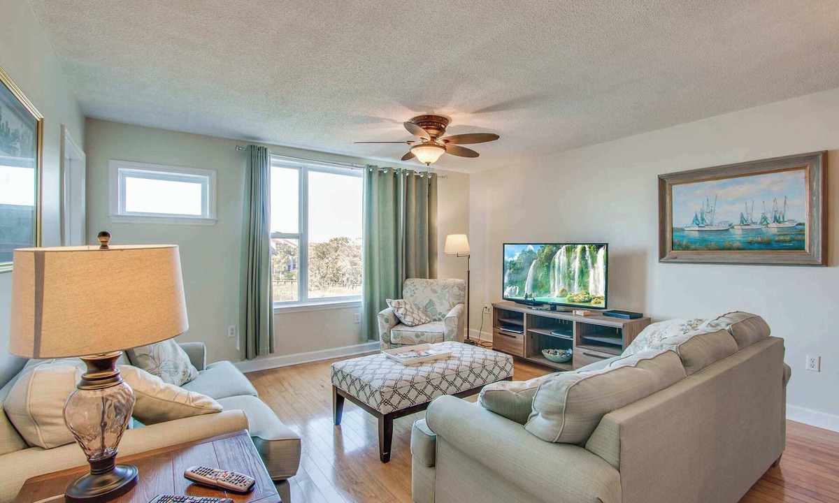 Folly Beach House | Second-floor condo with river views and access to a community pool