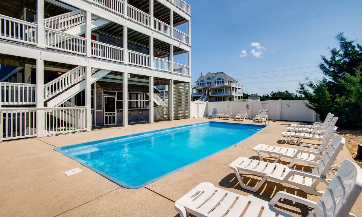 Wind Over Waves House | Soundside Home w/Pool, Hot Tub, Elevator, Game Room, Tiki Bar, and Much More!
