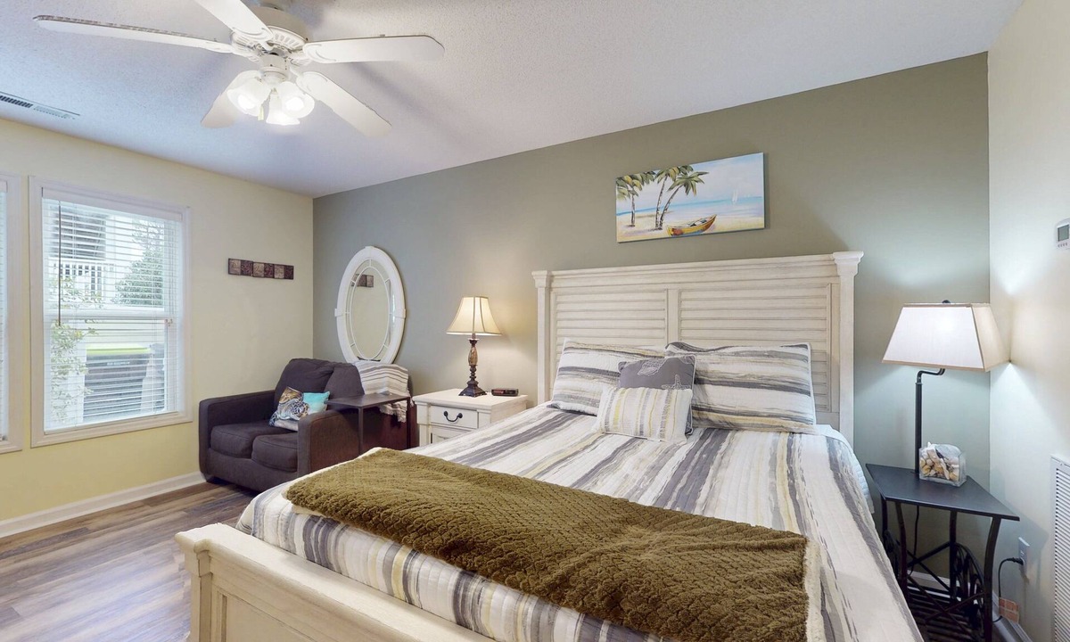 St. James Condo | STJ22B: Coastal Condo with golf course view and shared pool access