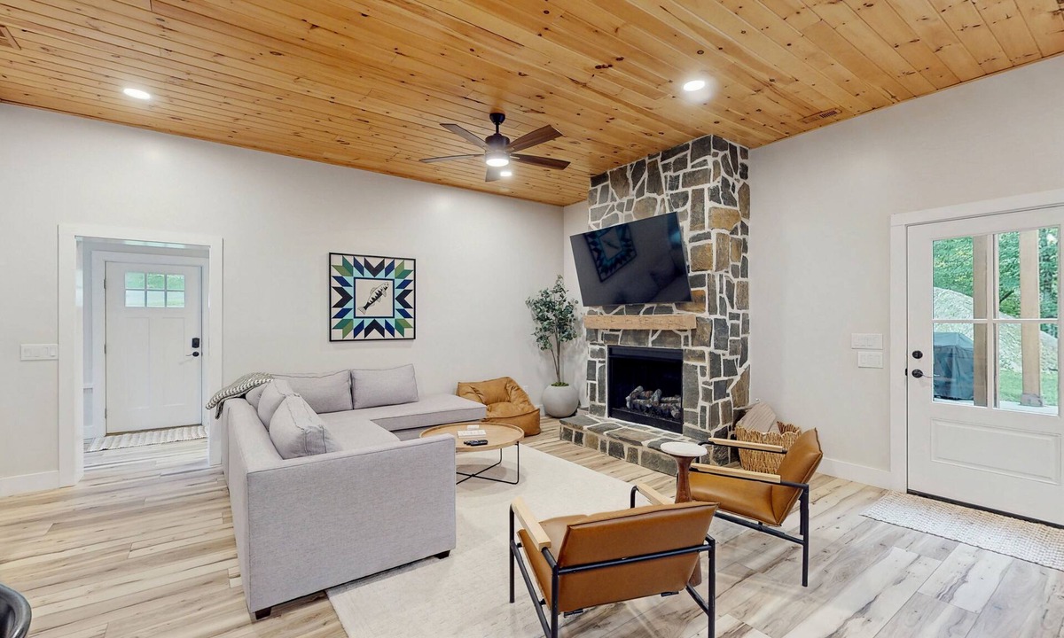 Foscoe Cottage | Stunning dog-friendly cottage with riverfront patio, hot tub, fire pit, & views