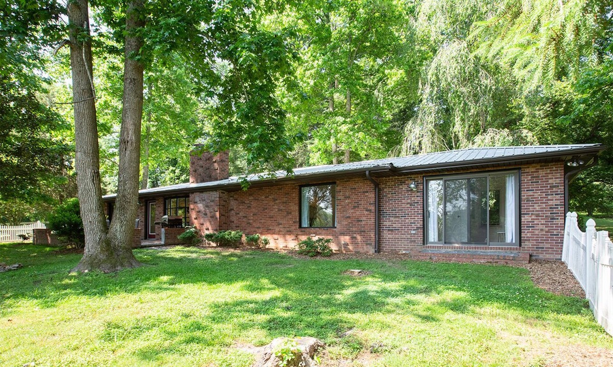 Hendersonville Cottage | Stylish cottage bordering one of the farm's sweeping pastures.