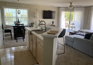 Beautiful Second Floor 2-Bedroom Two-Bath Condo With Water and Golf Views