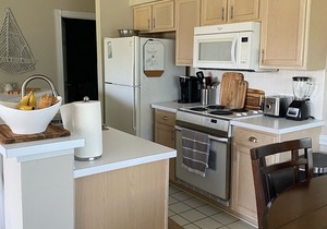 Beautiful Second Floor 2-Bedroom Two-Bath Condo With Water and Golf Views