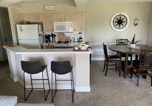 Beautiful Second Floor 2-Bedroom Two-Bath Condo With Water and Golf Views