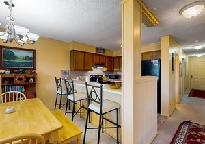 Homey condo with great ski slope & sunset view, pool, hot tub & fireplace
