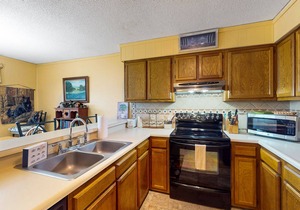 Homey condo with great ski slope & sunset view, pool, hot tub & fireplace