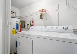 Large, contemporary condo w/ open living area, pond views & close to tennis!