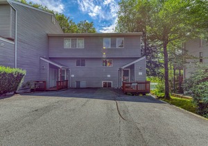 Large, contemporary condo w/ open living area, pond views & close to tennis!