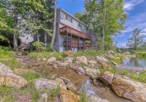 Large, contemporary condo w/ open living area, pond views & close to tennis!
