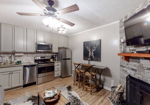 Mountain condo w/ a wood-burning fireplace & access to a pool, hot tub, & sauna!