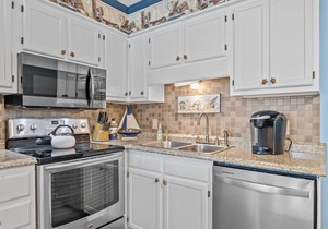 Ocean-view condo with beach access, WiFi, pool, washer/dryer, & AC