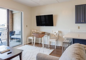 Riverfront condo with USS North Carolina view, balcony, central AC, and w/d