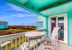 Second-Floor Condo with Ocean & Courtyard View, Balcony, WiFi, Shared Pool