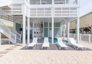 Waterfront with Dock,Free Golf Cart***, Pool,Elevator,Linens,Spectacular Sunsets