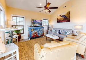 Welcoming home with screened porch, outdoor shower, elevator & central AC