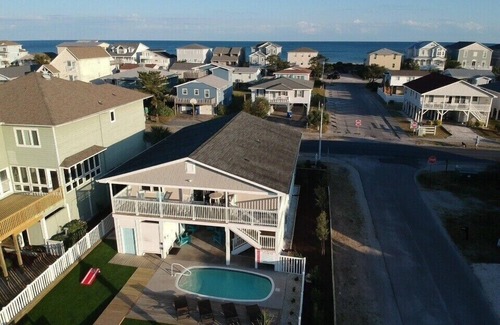 Ocean Isle Beach House | Canal/w dock, pool, ocean view, 1 block from beach & EV charger