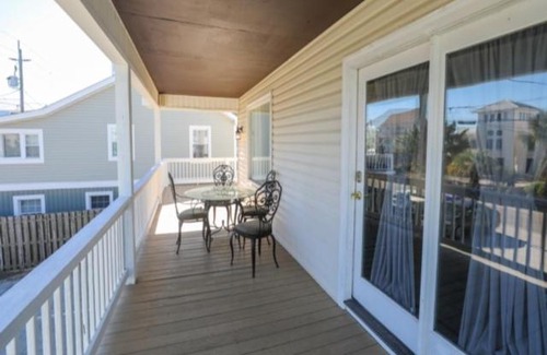 Carolina Beach Apartment | Carolina Ease - The perfect condo for an easy beach getaway - large deck and just steps to the beach! apts