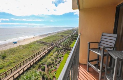 Carolina Beach Apartment | Coastal Cabana - Enjoy the gorgeous oceanfront sunrise from your 4th floor balcony, Walk to the Carolina Beach Boardwalk condo