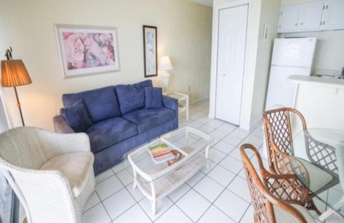 Carolina Beach Apartment | Coastal Cabana - Enjoy the gorgeous oceanfront sunrise from your 4th floor balcony, Walk to the Carolina Beach Boardwalk condo