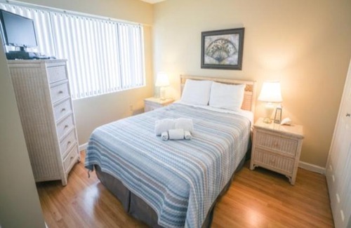 Carolina Beach Apartment | Coastal Cabana - Enjoy the gorgeous oceanfront sunrise from your 4th floor balcony, Walk to the Carolina Beach Boardwalk condo