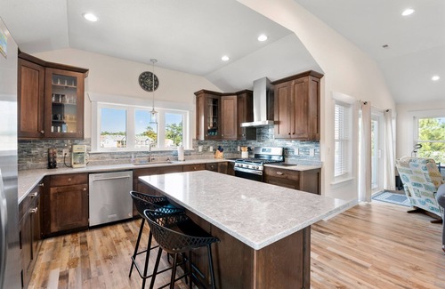 Colington Harbour House | Dockside Dream: Canalfront, Hot Tub, Elevator