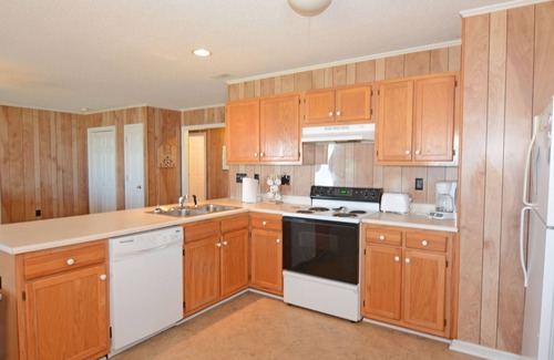 Kure Beach House | Ebbtide –Kure Beach oceanfront home with screened porch, private beach access