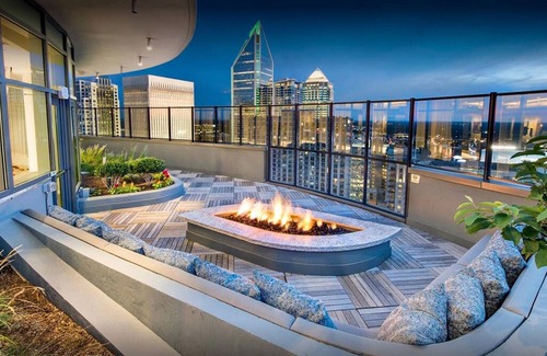 Charlotte Center City Apartment | Epic Penthouse · Roof Top Gym & Pool · City Views & Balcony