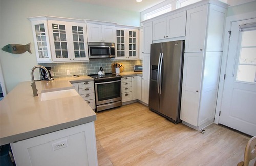 Shell Island House | Experience the beach life with this relaxing oceanfront home.