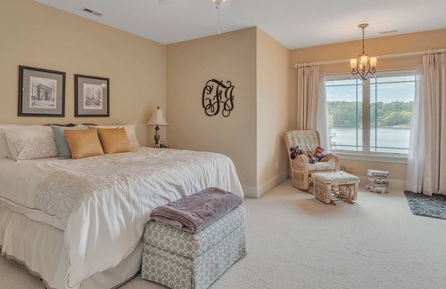 Steele Creek House | Extraordinary Lake Front Home with boat dock , private deck and fire pit by RedAwning