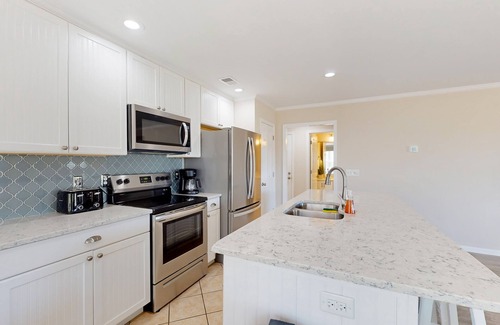 Sea Trail Condo | First-floor condo with golf, pool, gym, & tennis - direct beach access & patio