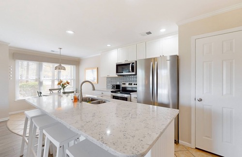 Sea Trail Condo | First-floor condo with golf, pool, gym, & tennis - direct beach access & patio