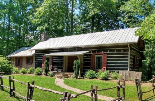 Robbinsville Cabin | Historic Log Cabin: Lake Front, Dock, Canoes, Private, Stylish